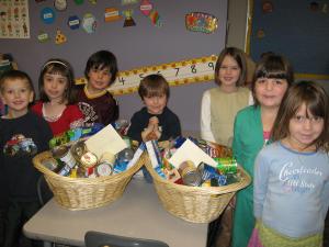 Children making baskets to distribute to families in need for Thanksgiving
